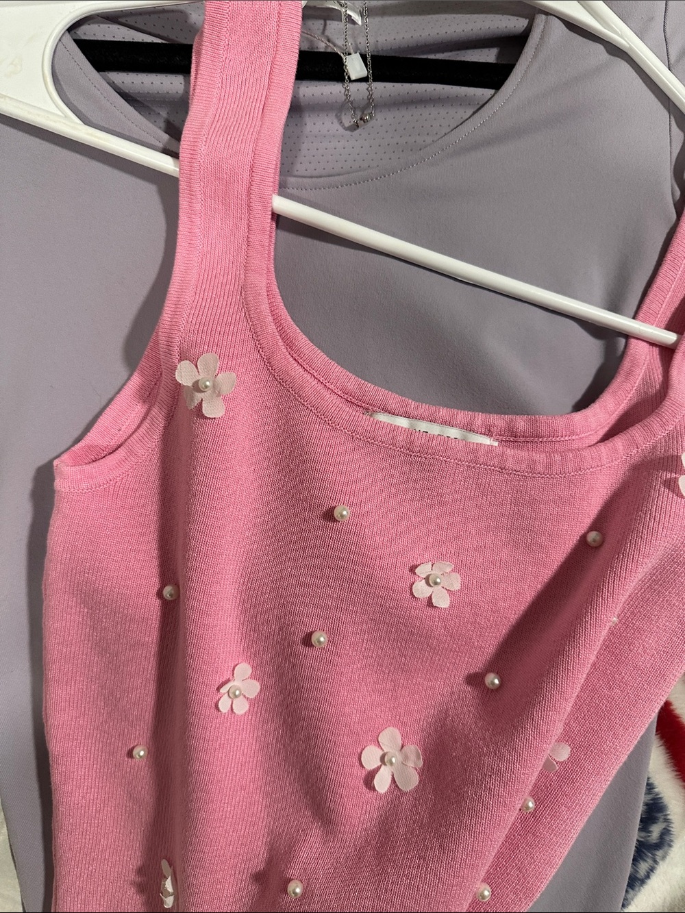 Purple 1piece
Skims set 
Pink tank with white flowers.